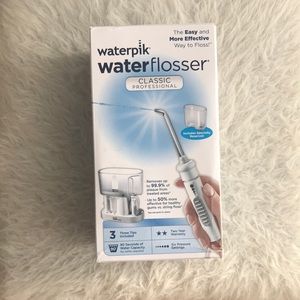 NEW! Waterpik Waterflosser. Model WP-72